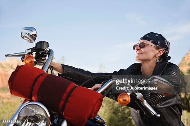 senior woman sitting on motorcycle - old motorcycles bildbanksfoton och bilder
