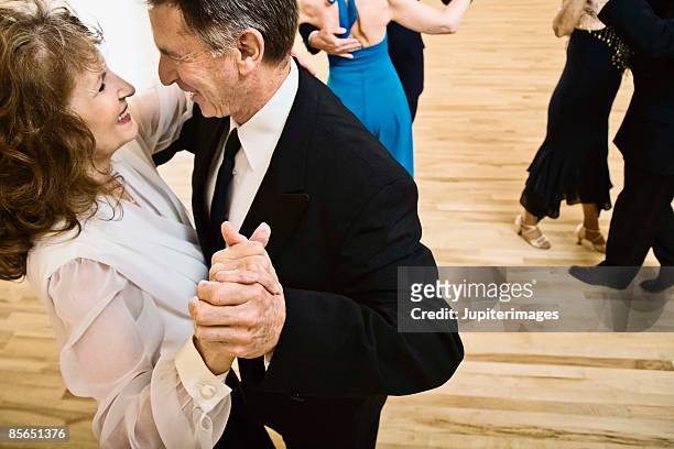 couple ballroom dancing - ballroom dancing stock pictures, royalty-free photos & images