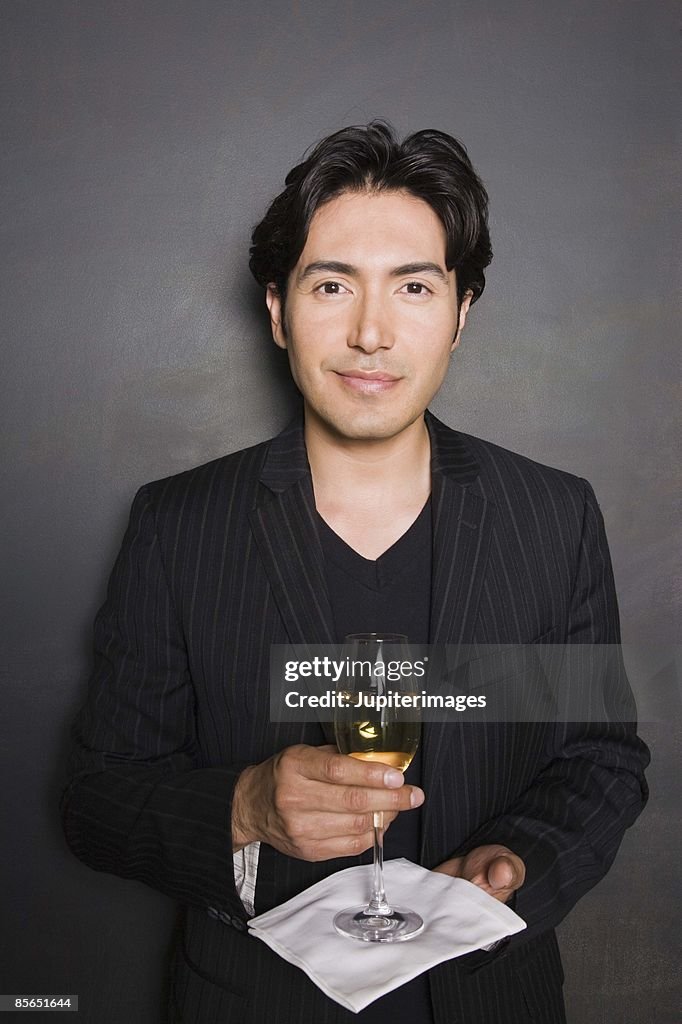 Portrait of man with wine