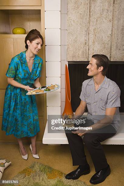 retro couple with food and cocktails - scotch whisky stock pictures, royalty-free photos & images