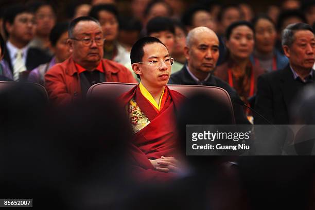 The Panchen Lama, Gyaltsen Norbu, attends a government symposium to mark the 50th anniversary on the liberation of Tibetan slaves at the Great Hall...