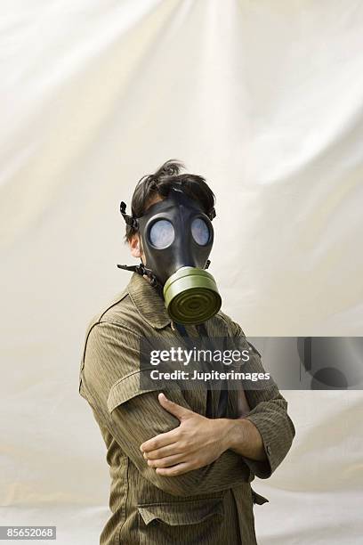 man with gas mask - gasmask bildbanksfoton och bilder