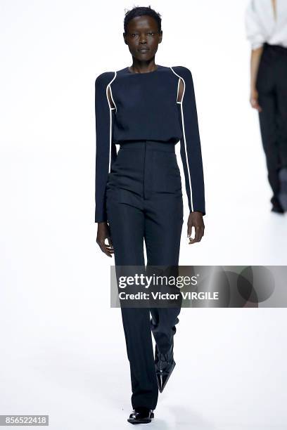 Model walks the runway during the Haider Ackermann Ready to Wear Spring/Summer 2018 fashion show as part of the Paris Fashion Week Womenswear...