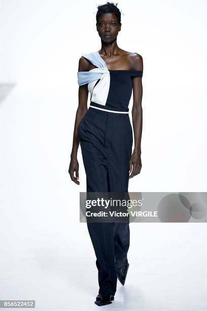 Model walks the runway during the Haider Ackermann Ready to Wear Spring/Summer 2018 fashion show as part of the Paris Fashion Week Womenswear...