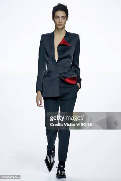 Model walks the runway during the Haider Ackermann Ready to Wear Spring/Summer 2018 fashion show as part of the Paris Fashion Week Womenswear...