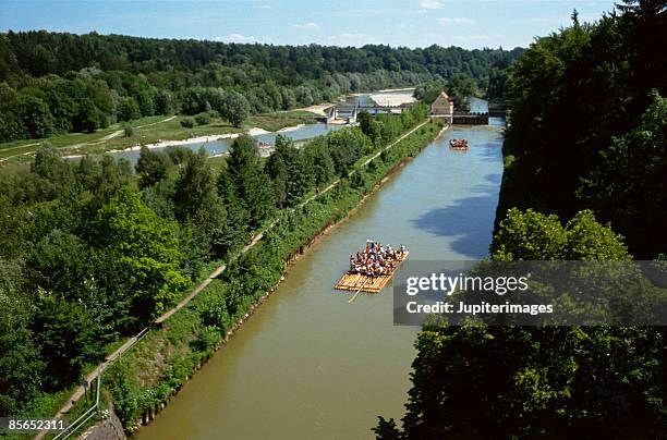 people rafting on isar river , bavaria , germany - río isar fotografías e imágenes de stock