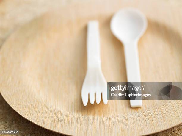 eco-friendly plate and utensils - cornstarch stock pictures, royalty-free photos & images