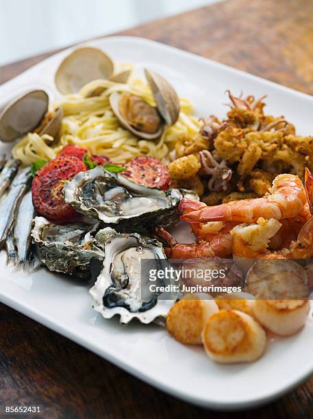 feast of the seven fishes seafood platter - seafood platter bildbanksfoton och bilder