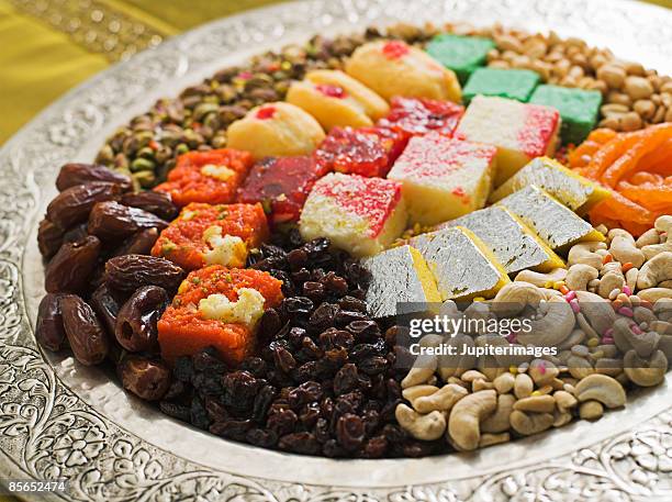 platter of diwali sweets - mithai stock pictures, royalty-free photos & images