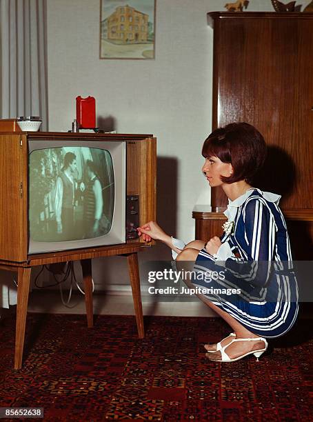 woman watching television - old tv stock pictures, royalty-free photos & images