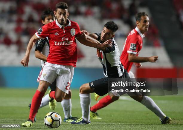 Benfica forward Pizzi from Portugal with Portimonense SC midfielder Pedro Sa from Portugal in action during the Primeira Liga match between SL...