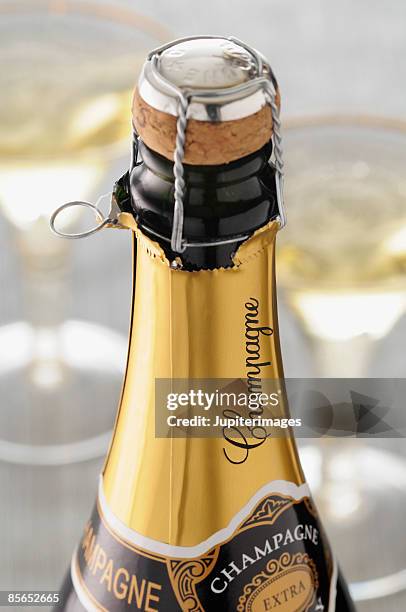 champagne bottle - bouteille champagne stock pictures, royalty-free photos & images