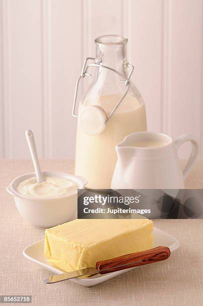 assortment of fresh dairy products - melkprodukt stockfoto's en -beelden