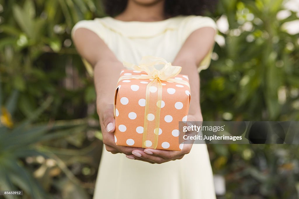 Woman holding present