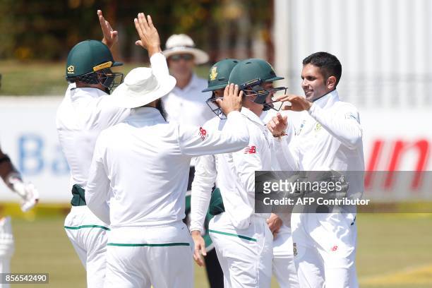 South African bowler Keshav Maharaj celebrates the dismissal of Bangladesh batsman Sabbir Rahman during the fifth day of the Test Match between South...