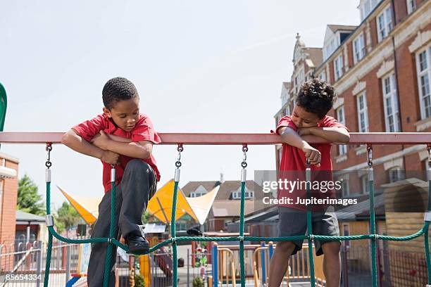 boys on a jungle gym - children only stock pictures, royalty-free photos & images