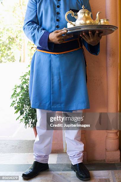 Butler Tea Ritual 59 Butler Serving Tea Stock Photos, High-Res Pictures, and Images ...