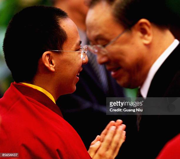 The Panchen Lama, Gyaltsen Norbu , talks with Chinese authorities after a government symposium to mark the 50th anniversary on the liberation of...