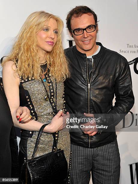Musician Courtney Love and photographer David LaChapelle attend the opening celebration of The Annenberg Space for Photography on March 26, 2009 in...