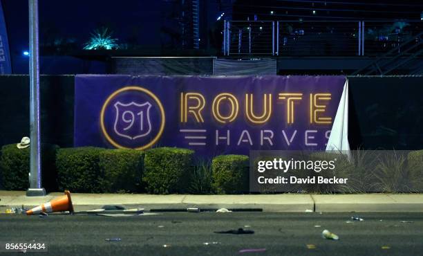 Banner hangs on the fence at the Route 91 Harvest country music festival grounds after a active shooter was reported on October 2, 2017 in Las Vegas,...