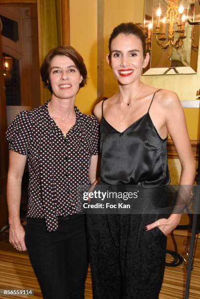 Actresses Irene Jacob and Louise Monot attend the John Galliano show as part of the Paris Fashion Week Womenswear Spring/Summer 2018 on October 1,...