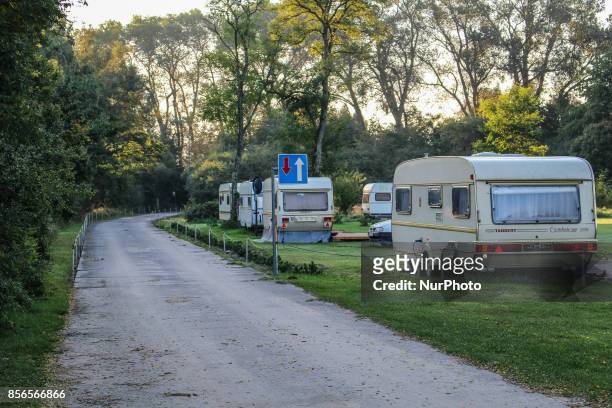 Caravans at the camping at the Gardno lake in Slowinskie Lakeland are seen in Retowo , on 1 October 2017 . People enjoy sunny and warm autumn weather...