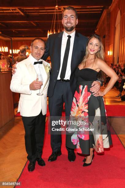 Bridegroom Erdogan Atalay and Simon Guse and Arzu Bazman during the church wedding of Erdogan Atalay and Katja Ohneck at Heidelberg Castle on...