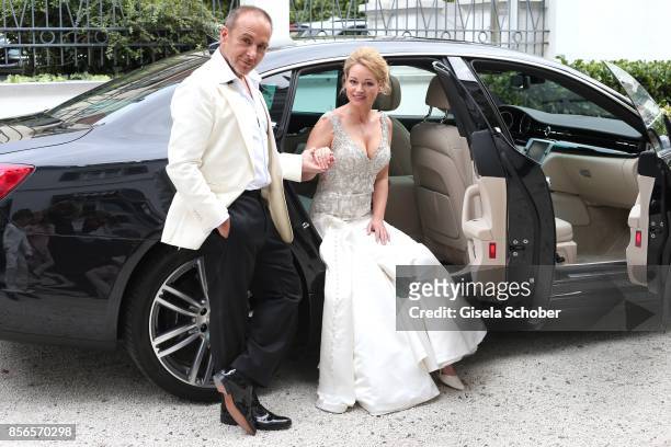 Bridegroom Erdogan Atalay and his wife Katja Ohneck before their church wedding at Heidelberg Castle on September 30, 2017 in Heidelberg, Germany.
