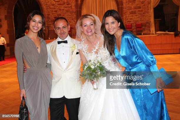 Gizem Emre, Bridegroom Erdogan Atalay and his wife Katja Ohneck, Chryssanthi Kavazi during their church wedding at Heidelberg Castle on September 30,...