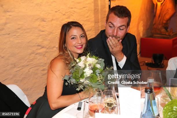 Arzu Bazman and her boyfriend Simon Guse after she caught the bride bouquet during the church wedding of Erdogan Atalay and Katja Ohneck at...