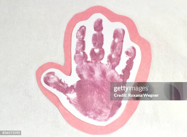 millennial pink hand print - millennial pink fotografías e imágenes de stock