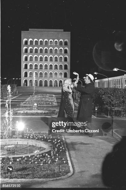 Italian film director Federico Fellini directing actress Anita Ekberg during the shooting of the movie 'Boccaccio '70', Rome EUR 1961.