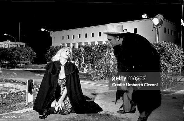 Italian film director Federico Fellini directing actress Anita Ekberg during the shooting of the movie 'Boccaccio '70', Rome EUR 1961.