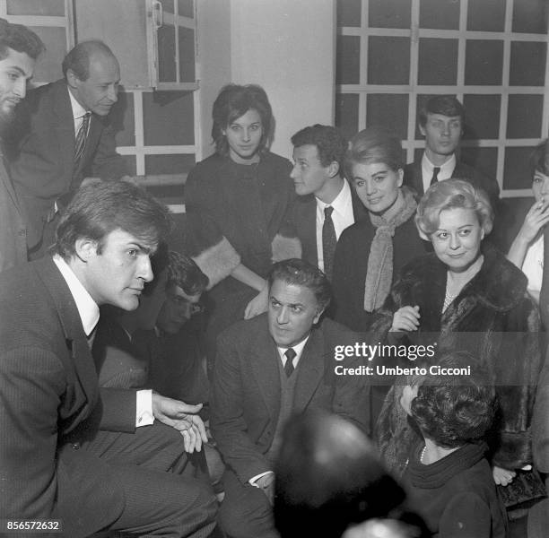 Italian film director Federico Fellini, actress Giulietta Masina and their students at the inauguration of the school 'Al Fersen' in Via della...