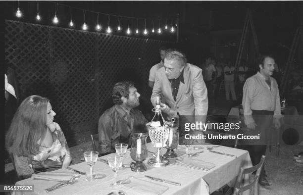 Italian film director Federico Fellini with Italian actor Marcello Mastroianni and Italian cinematographer Giuseppe Rotunno during the shooting of...