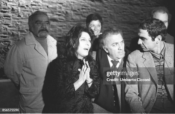 Film director Federico Fellini with actress Anna Magnani and director of photography Giuseppe Rotunno during the movie 'Roma', Rome 1971.