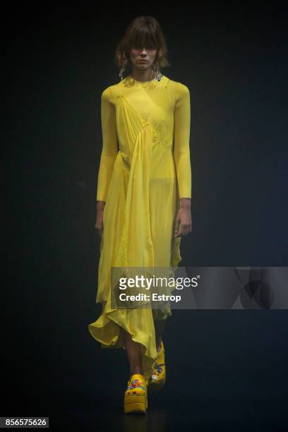 Model walks the runway during the Balenciaga show as part of the Paris Fashion Week Womenswear Spring/Summer 2018 on October 1, 2017 in Paris, France.