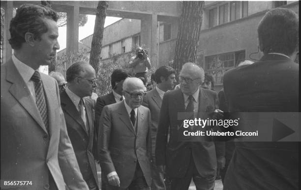 Film director Federico Fellini at Cinecittà Studios with politician Sandro Pertini for the annual film award 'Globo d'oro'.