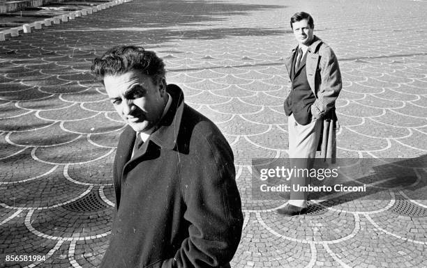 Film director Federico Fellini with actor Marcello Mastroianni in EUR Rome, 1962.