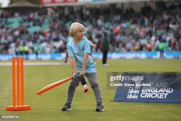 Youngsters participate in an All Stars Cricket session during the interval at the 4th Royal London One Day International between England and West...