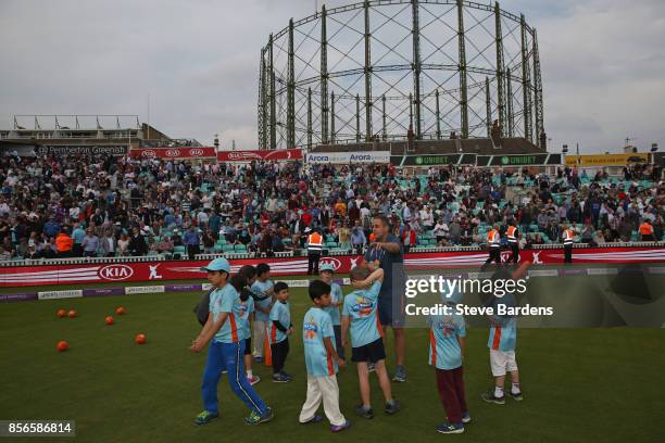 Youngsters participate in an All Stars Cricket session during the interval at the 4th Royal London One Day International between England and West...