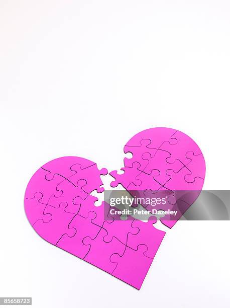 broken heart jigsaw puzzle. - broken toy stock pictures, royalty-free photos & images