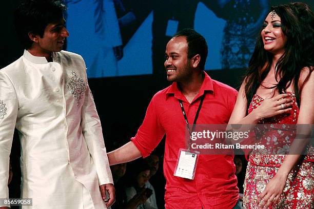 Bollywood Actors Sonu Sood and Shweta walk the runway with the designer Abdul Halder during the Lakme India Fashion Week Autumn/Winter 2009 at Grand...