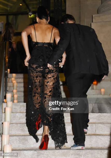 Shanina Shaik and a guest attend The Vogue Party : Outside Arrivals as part of the Paris Fashion Week Womenswear Spring/Summer 2018 on October 1,...
