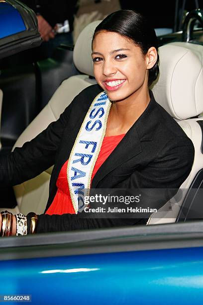 Miss France 2009 Chloe Mortaud poses with her new car, a '207 cabriolet', offer by Peugeot for her Miss France election at Parc des Expositions on...