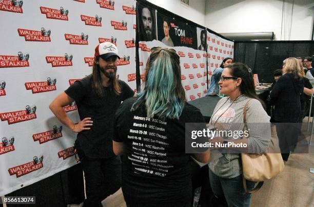 Tom Payne talks with fans about his time on the set of Walking Dead at Walker Stalker Con in Philadelphia, PA on October 1, 2017.