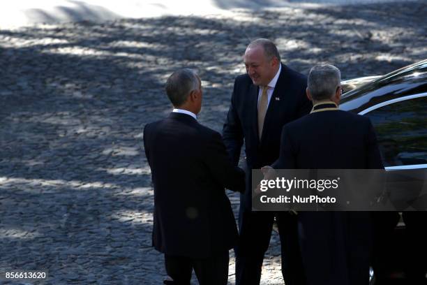 Portugal's President Marcelo Rebelo de Sousa welcomes Georgia's President Giorgi Margvelashvili at the Belem Palace in Lisbon, on October 2 during an...