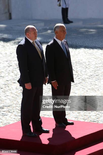 Portugal's President Marcelo Rebelo de Sousa and Georgia's President Giorgi Margvelashvili listens to the national anthems at the Belem Palace in...