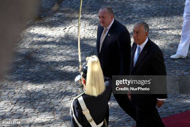 Portugal's President Marcelo Rebelo de Sousa and Georgia's President Giorgi Margvelashvili review the guards at the Belem Palace in Lisbon, on...