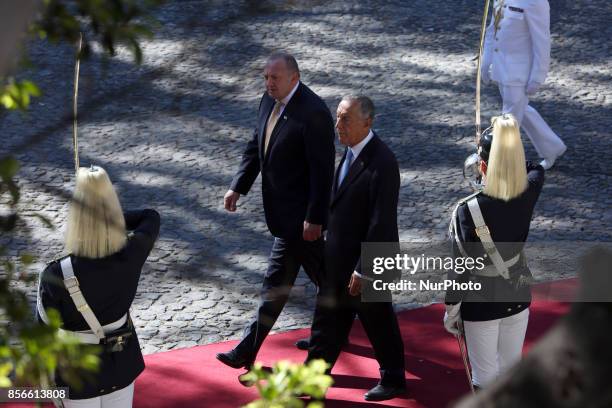 Portugal's President Marcelo Rebelo de Sousa and Georgia's President Giorgi Margvelashvili review the guards at the Belem Palace in Lisbon, on...